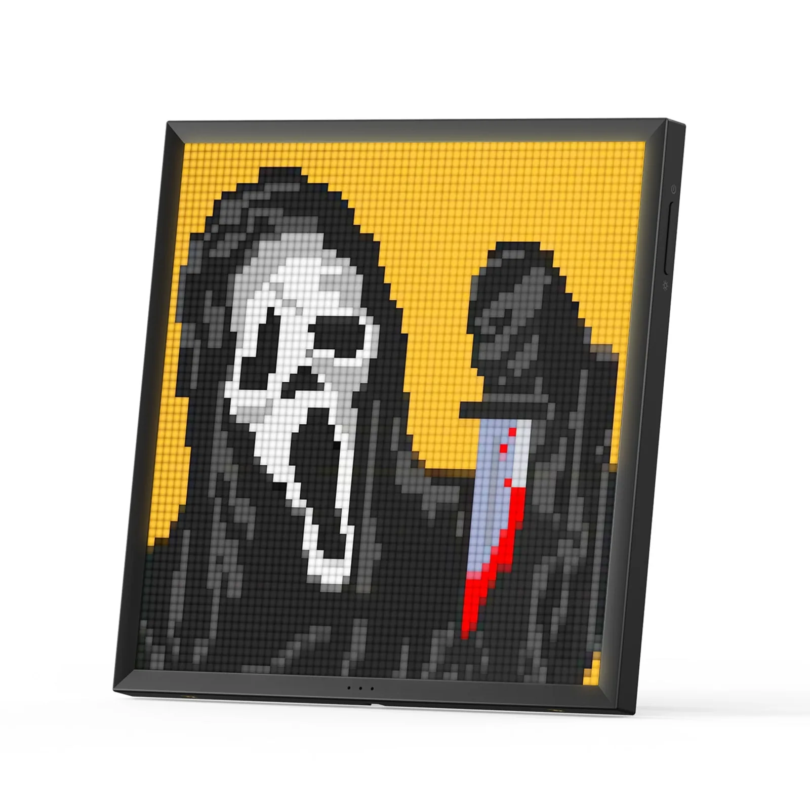 Écran Divoom Pixoo-64 noir affichant un personnage en pixel art sur fond jaune