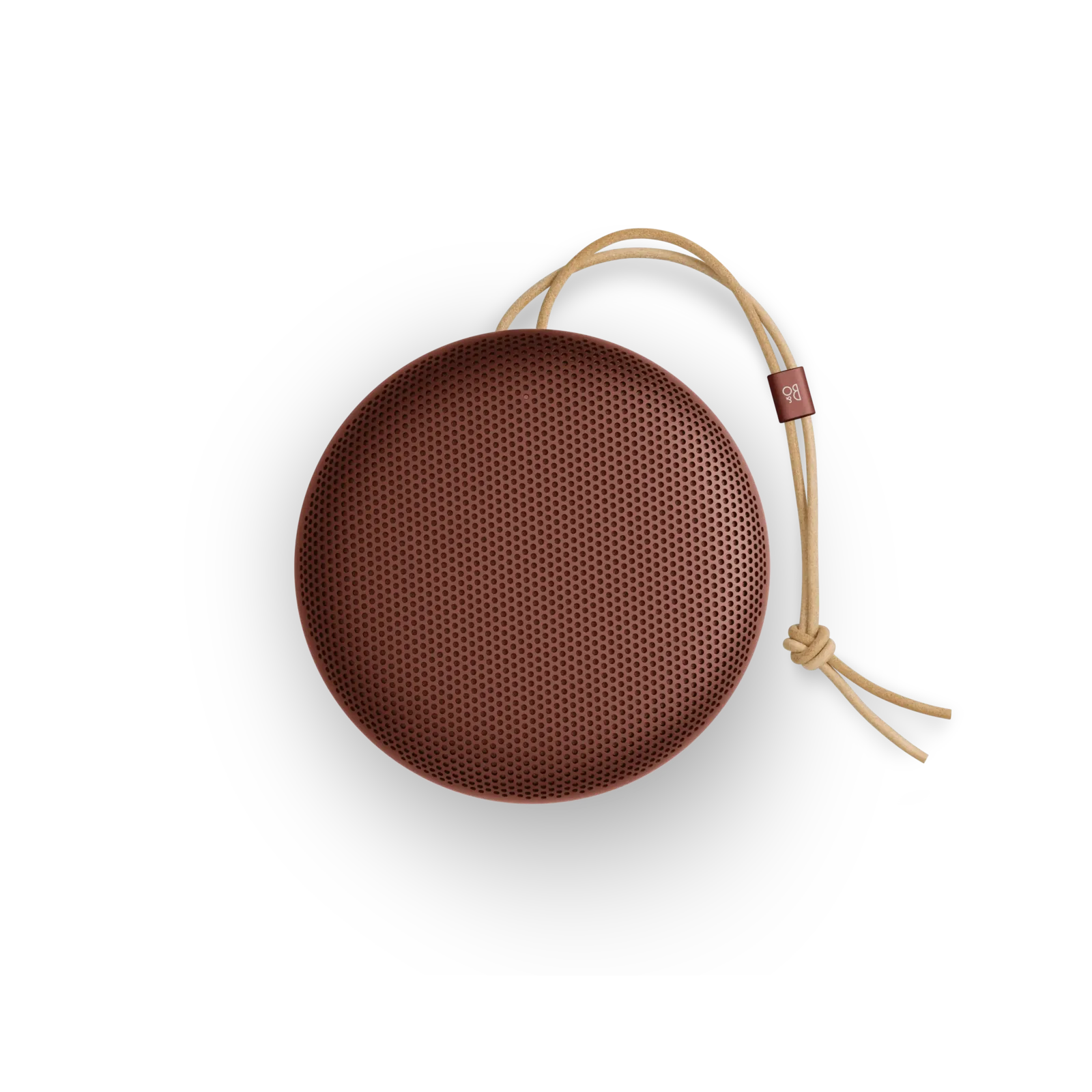 Enceinte Bang & Olufsen Beosound A1 3e génération rouge vue de dessus, avec sa sangle en cuir